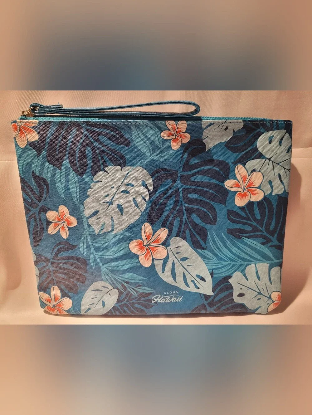 Clinique Set, Blue Hawaii, and Pink/Orange  Pouches.